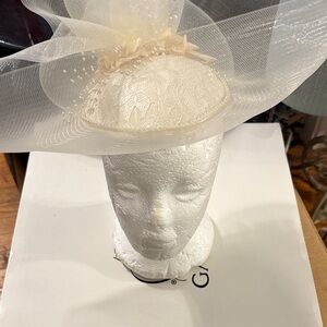 Elegant Cream Fascinator with Floral Accents